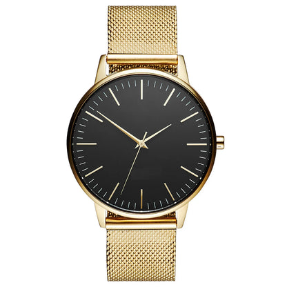 Gold mesh strap watch with black dial, minimalist design, luxury timepiece