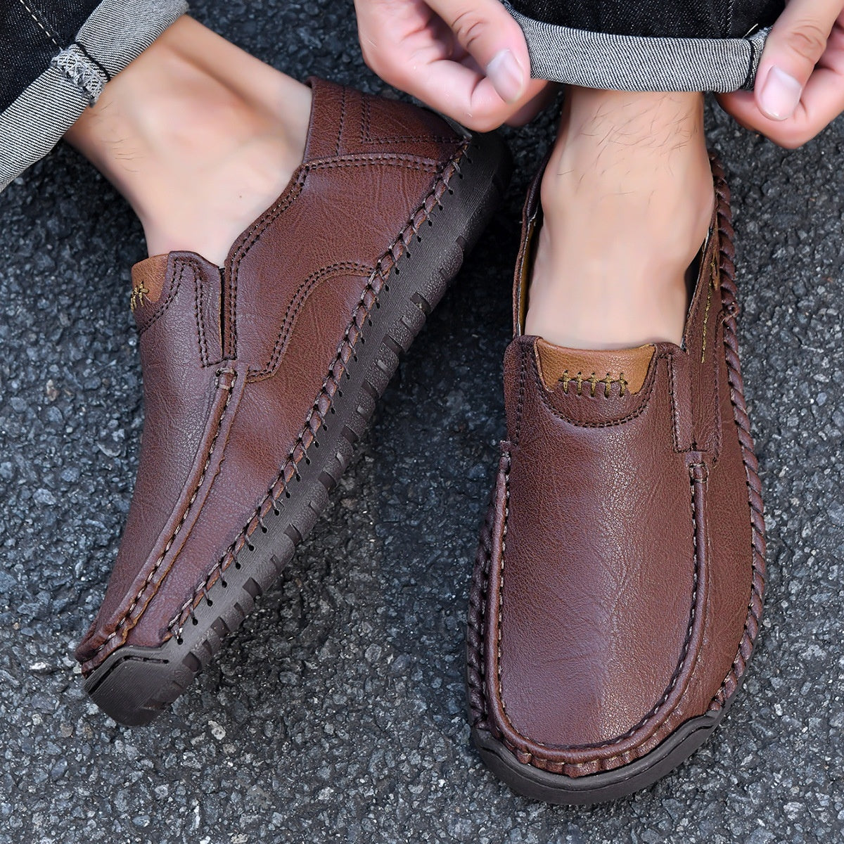 Brown leather loafers with braided detailing and comfortable sole, perfect for casual wear