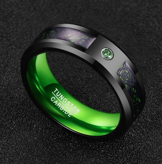 Black tungsten carbide ring with green interior, Celtic knot design, and emerald accent stone