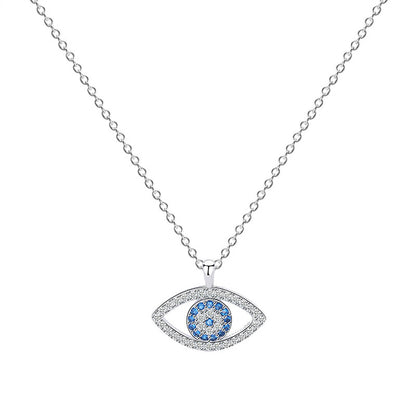 Elegant evil eye pendant necklace with blue and clear crystals on silver chain, minimalist luxury jewelry
