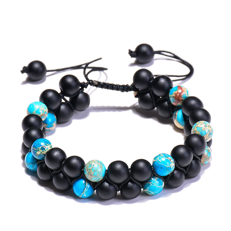 Black matte bead bracelet with turquoise stones, adjustable cord, minimalist luxury jewelry design