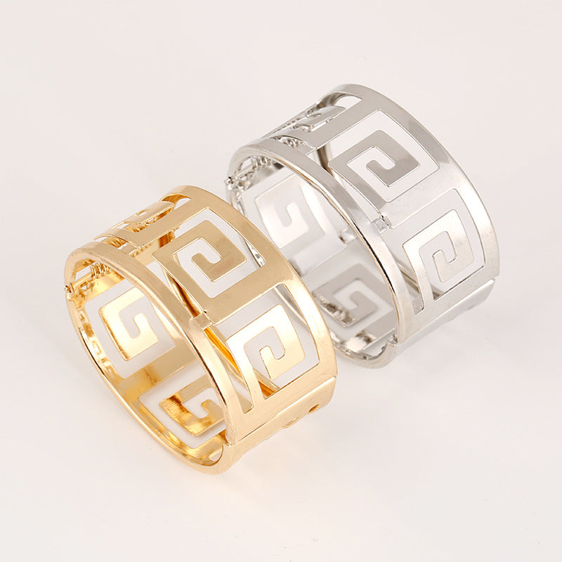 Gold and silver Greek key pattern rings, minimalist luxury jewelry design