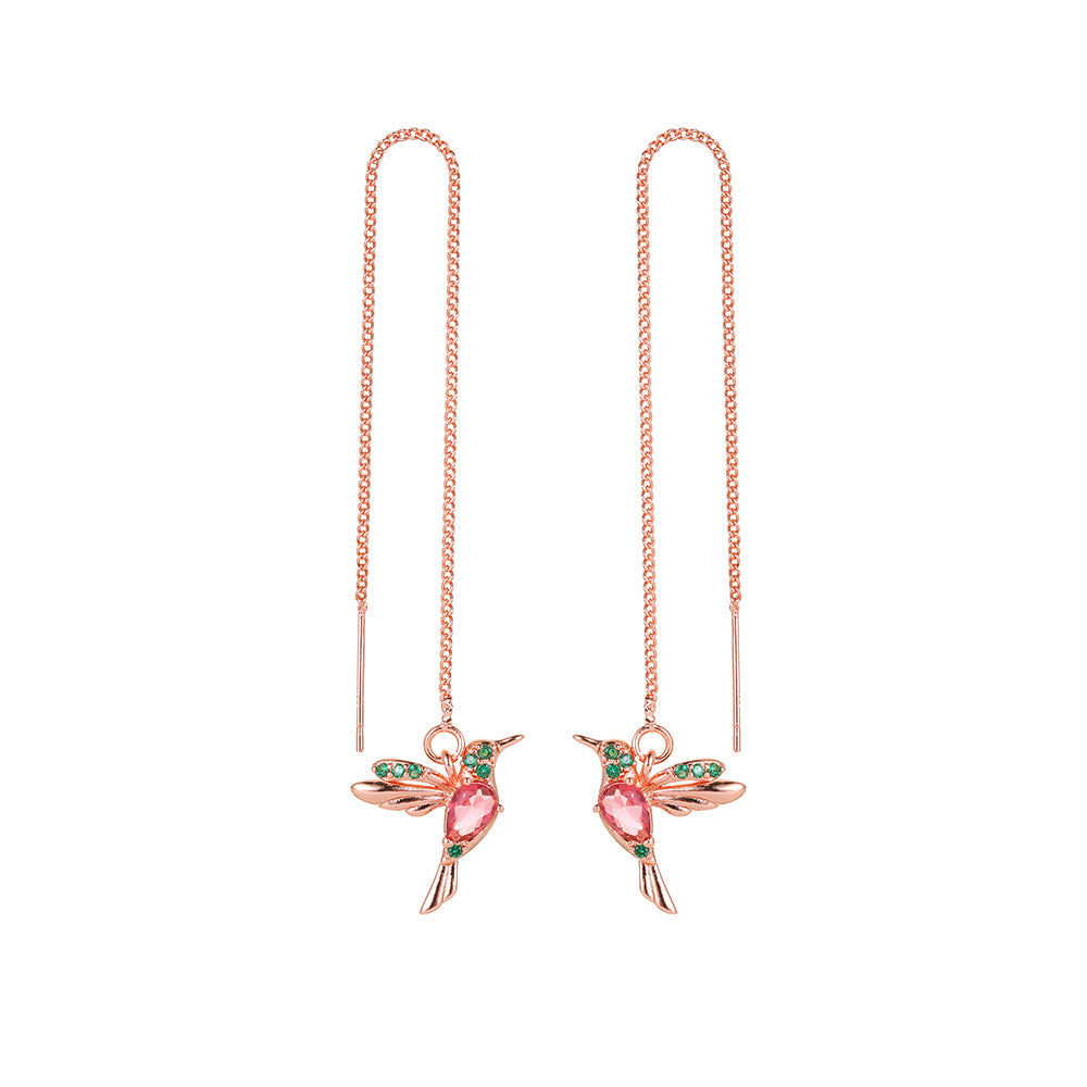 Rose gold hummingbird earrings with pink and green gemstones, minimalist luxury jewelry design