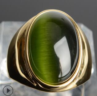 Luxury gold ring with green cat's eye gemstone, minimalist design, premium quality jewelry
