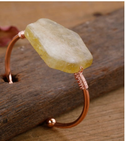 Handcrafted copper cuff bracelet with raw yellow stone, minimalist luxury jewelry design