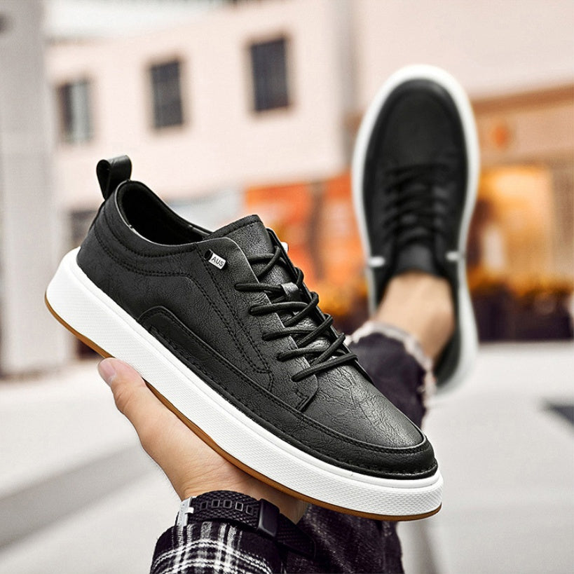 Black leather sneaker with white sole, handcrafted minimalist design, urban street style