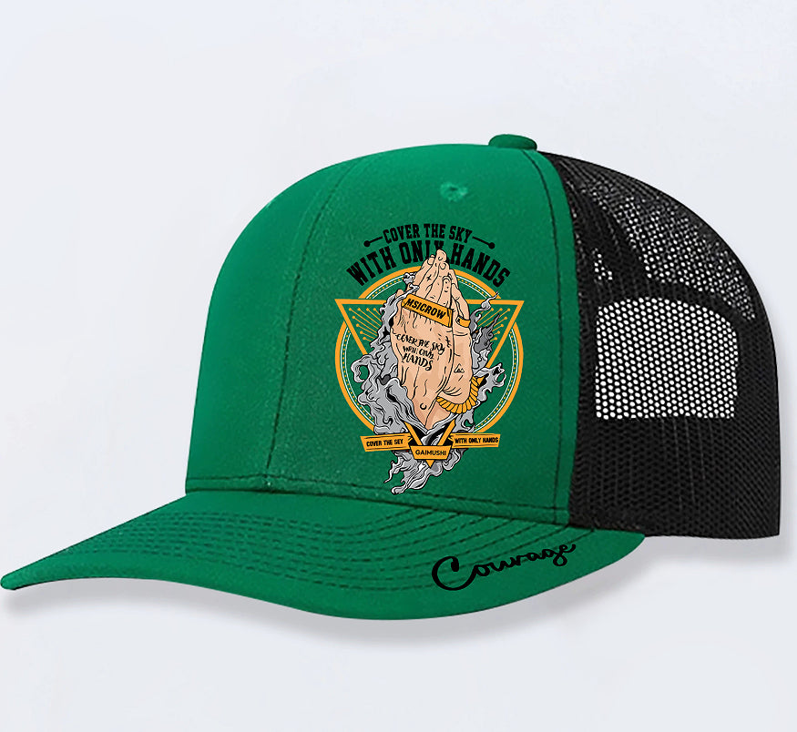 Green trucker hat with 'Cover the Sky' graphic, praying hands design, and 'Courage' script on brim