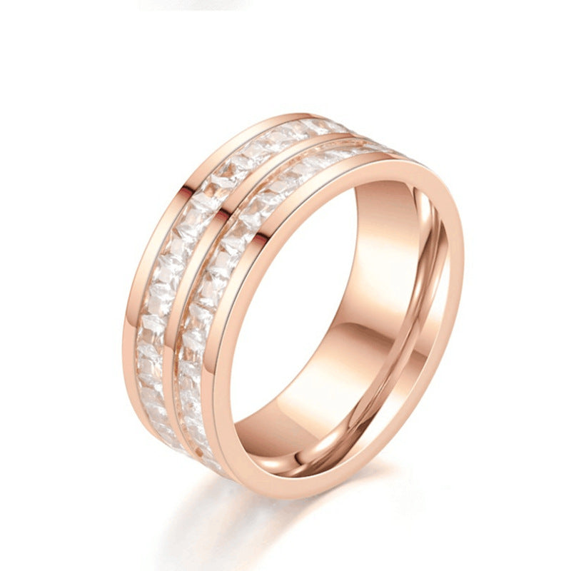 Rose gold ring with double row of sparkling clear stones, minimalist luxury jewelry design