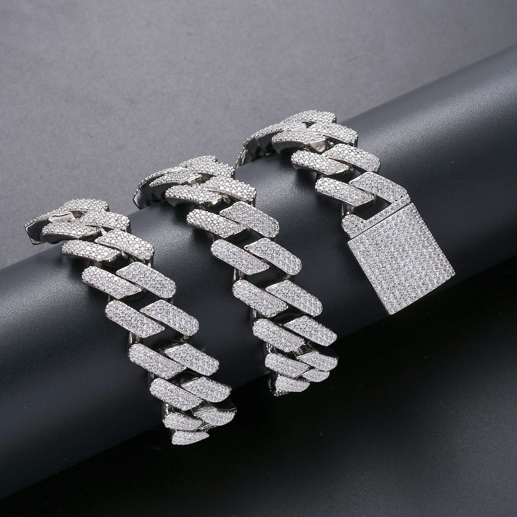 Luxury diamond-encrusted curb link bracelet with padlock clasp, minimalist premium jewelry design