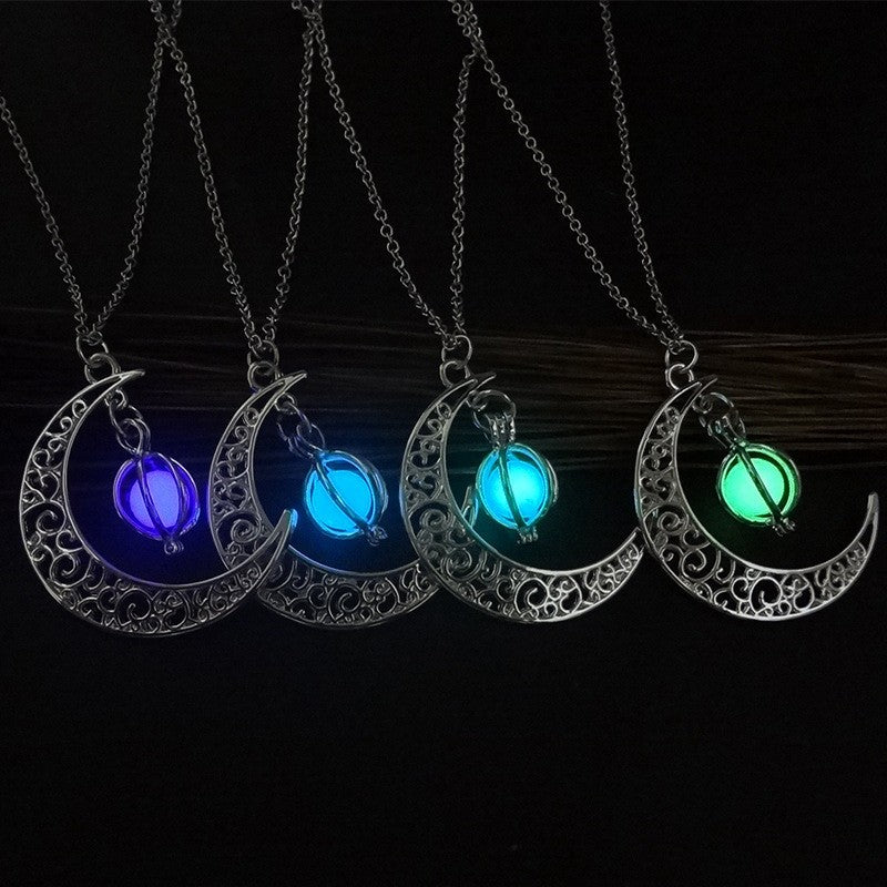 Glowing moon pendant necklaces with luminous orbs in purple, blue, teal, green on dark background