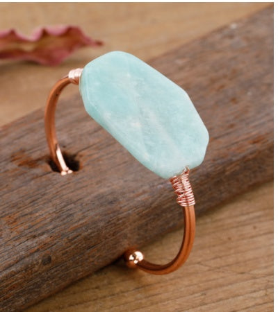 Handcrafted copper cuff bracelet with aquamarine stone, minimalist luxury jewelry design