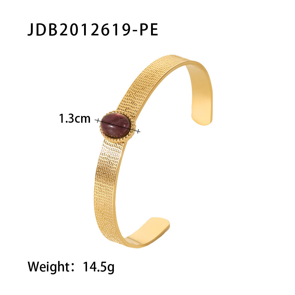 Gold mesh cuff bracelet with oval burgundy stone, 1.3cm width, 14.5g weight — minimalist luxury jewelry