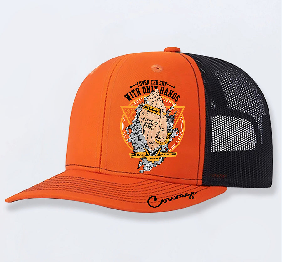 Orange and black trucker hat with 'Cover the Sky' graphic and 'Courage' script on brim