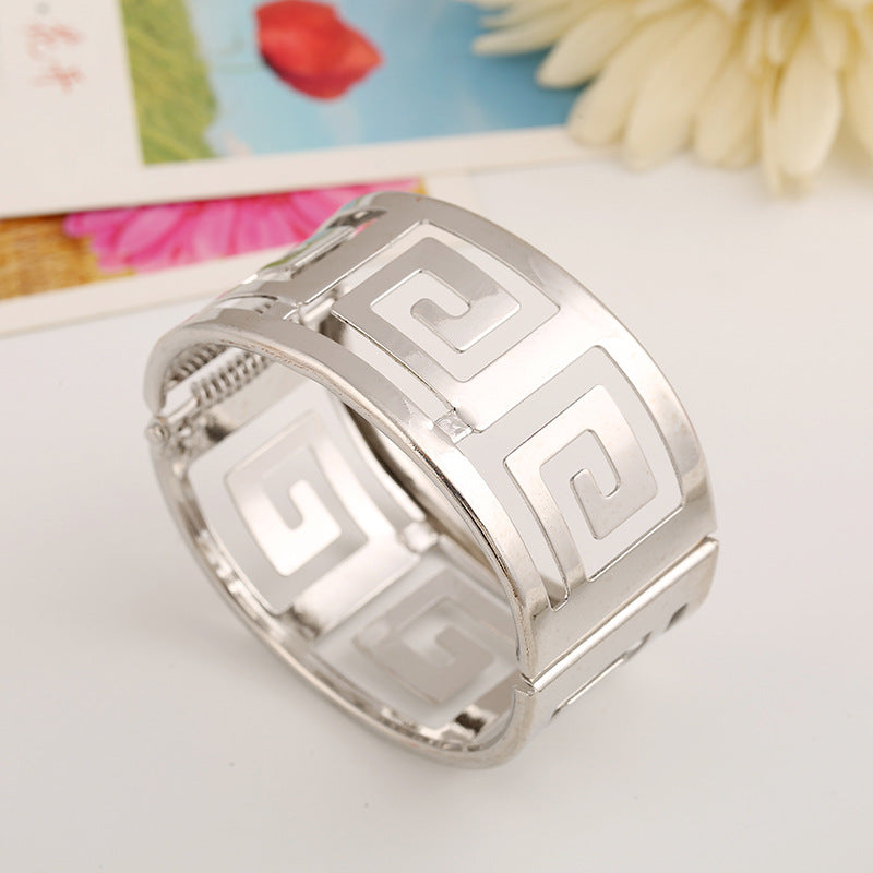 Silver Greek key pattern bangle bracelet with minimalist design