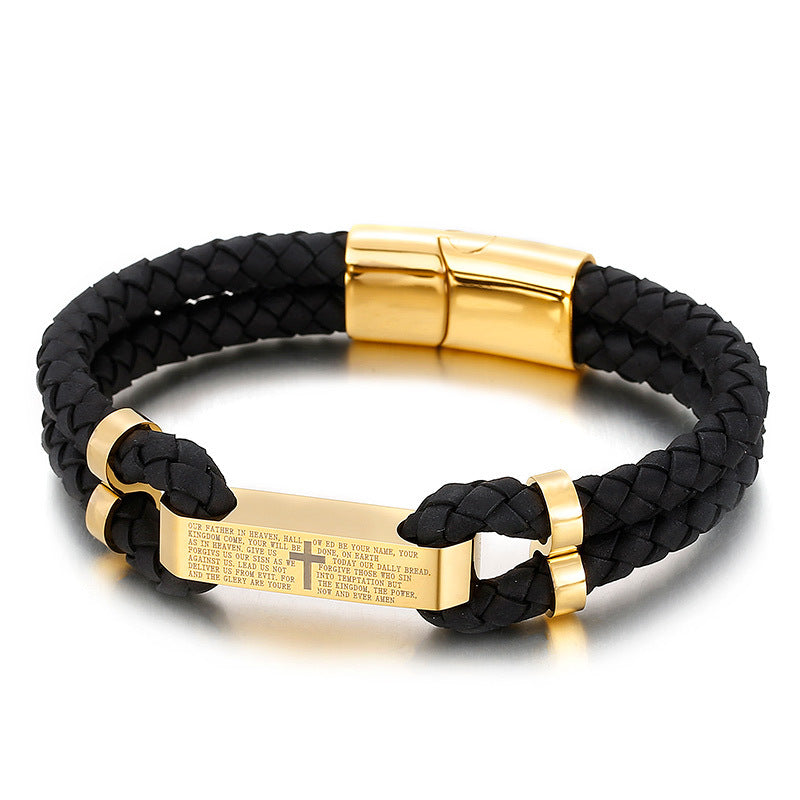 Black braided leather bracelet with gold-tone clasp and engraved prayer plate, minimalist luxury accessory
