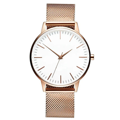 Rose gold minimalist watch with mesh strap and white dial, luxury timepiece design