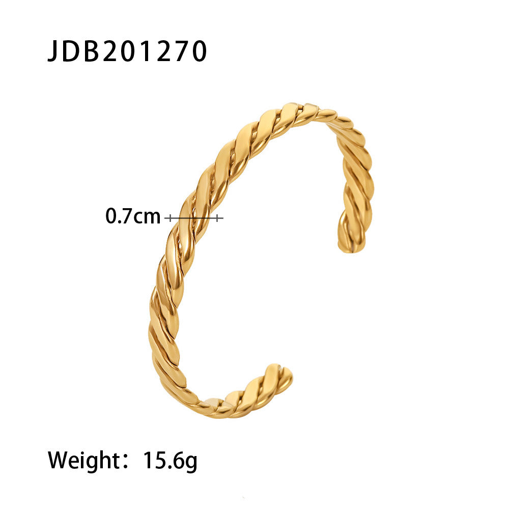 Gold twisted rope cuff bracelet, 0.7cm wide, 15.6g weight — minimalist luxury jewelry design