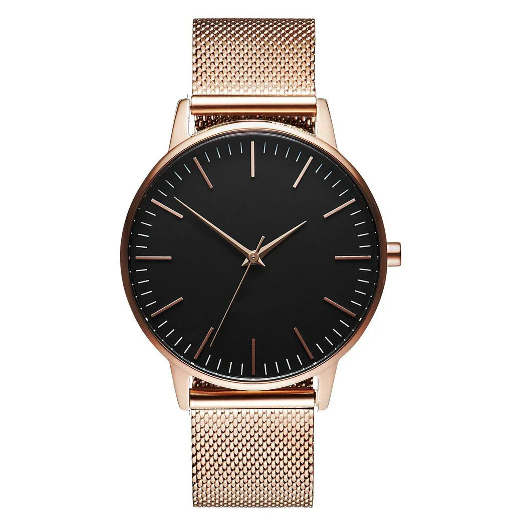 Rose gold minimalist watch with black dial and mesh strap, luxury timepiece design