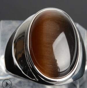 Luxury men's ring with oval tiger's eye stone, polished silver band, minimalist design
