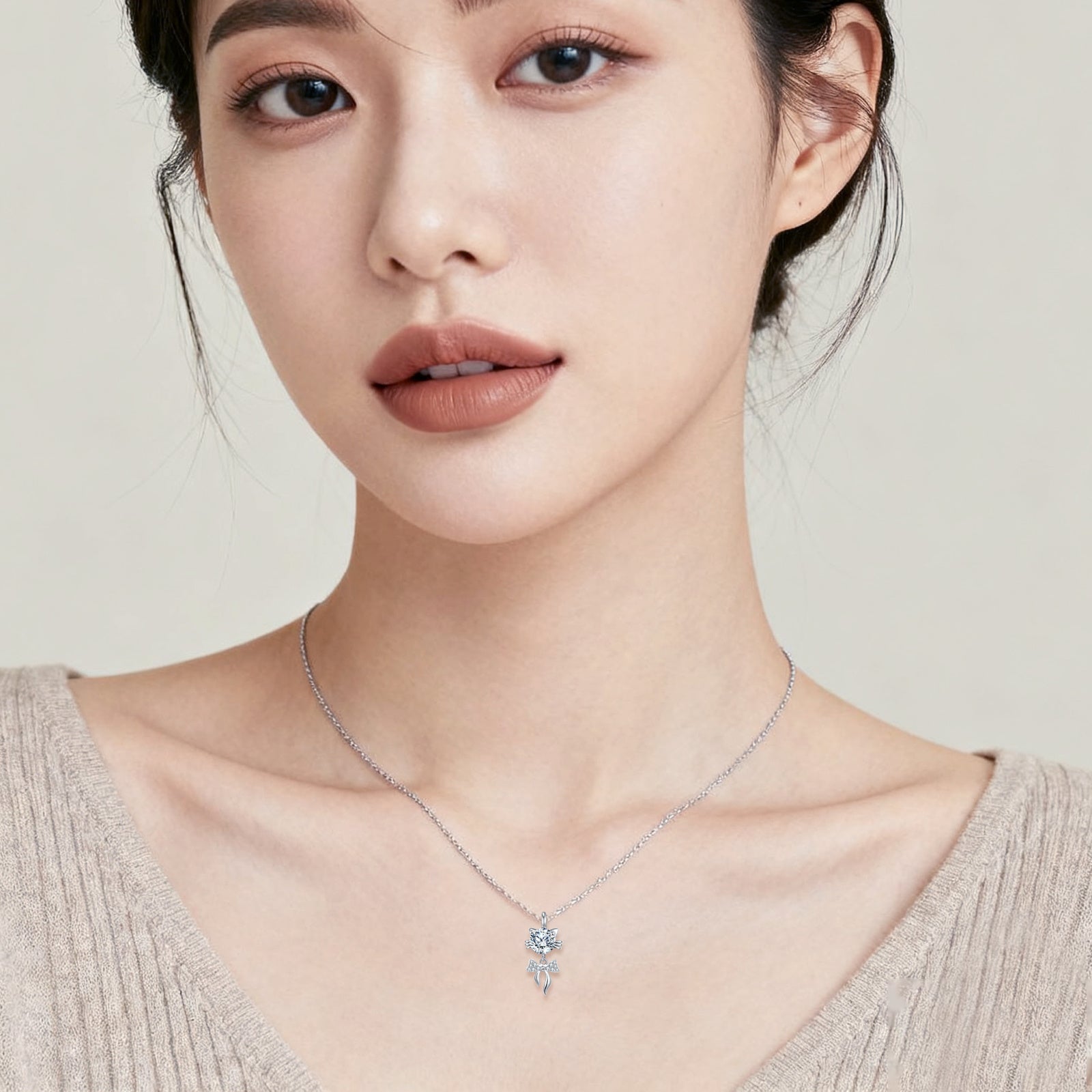 Elegant floral pendant necklace with sparkling stones, minimalist luxury jewelry design