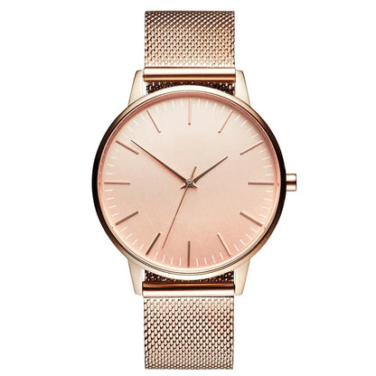 Rose gold minimalist watch with mesh band, sleek design for everyday luxury