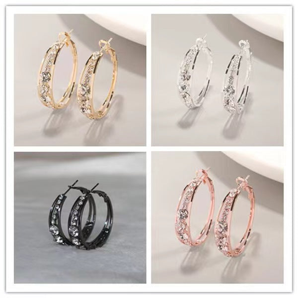 Elegant hoop earrings in gold, silver, black, and rose gold with sparkling crystals, minimalist luxury jewelry