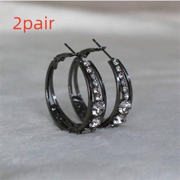 Black hoop earrings with sparkling crystals, minimalist luxury jewelry design