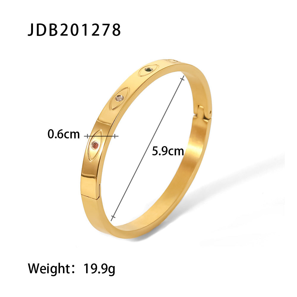 Gold bangle with embedded gemstones, 5.9cm diameter, 0.6cm width, 19.9g weight — minimalist luxury jewelry