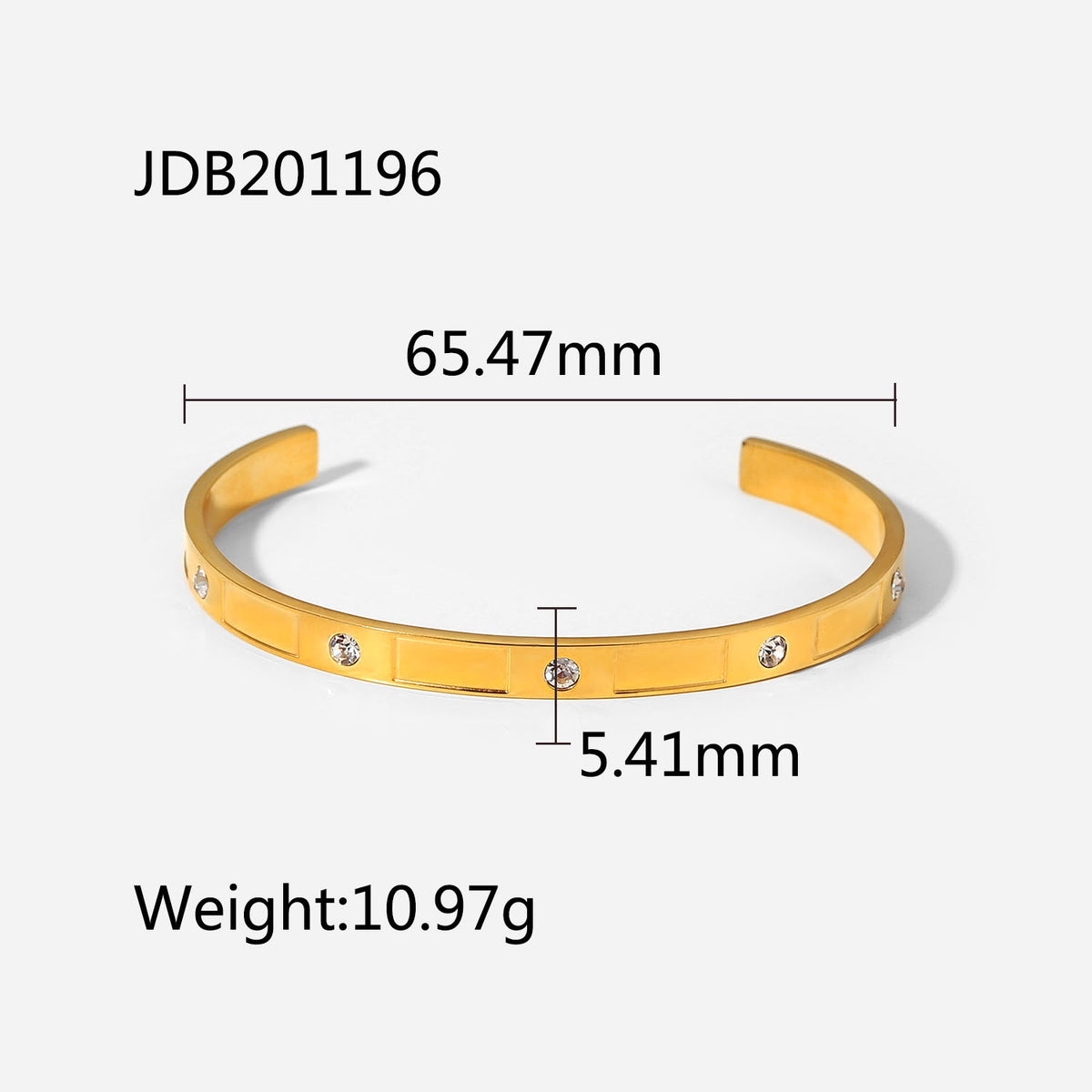 Gold cuff bracelet with crystal accents, 65.47mm width, 5.41mm height, 10.97g weight — minimalist luxury jewelry
