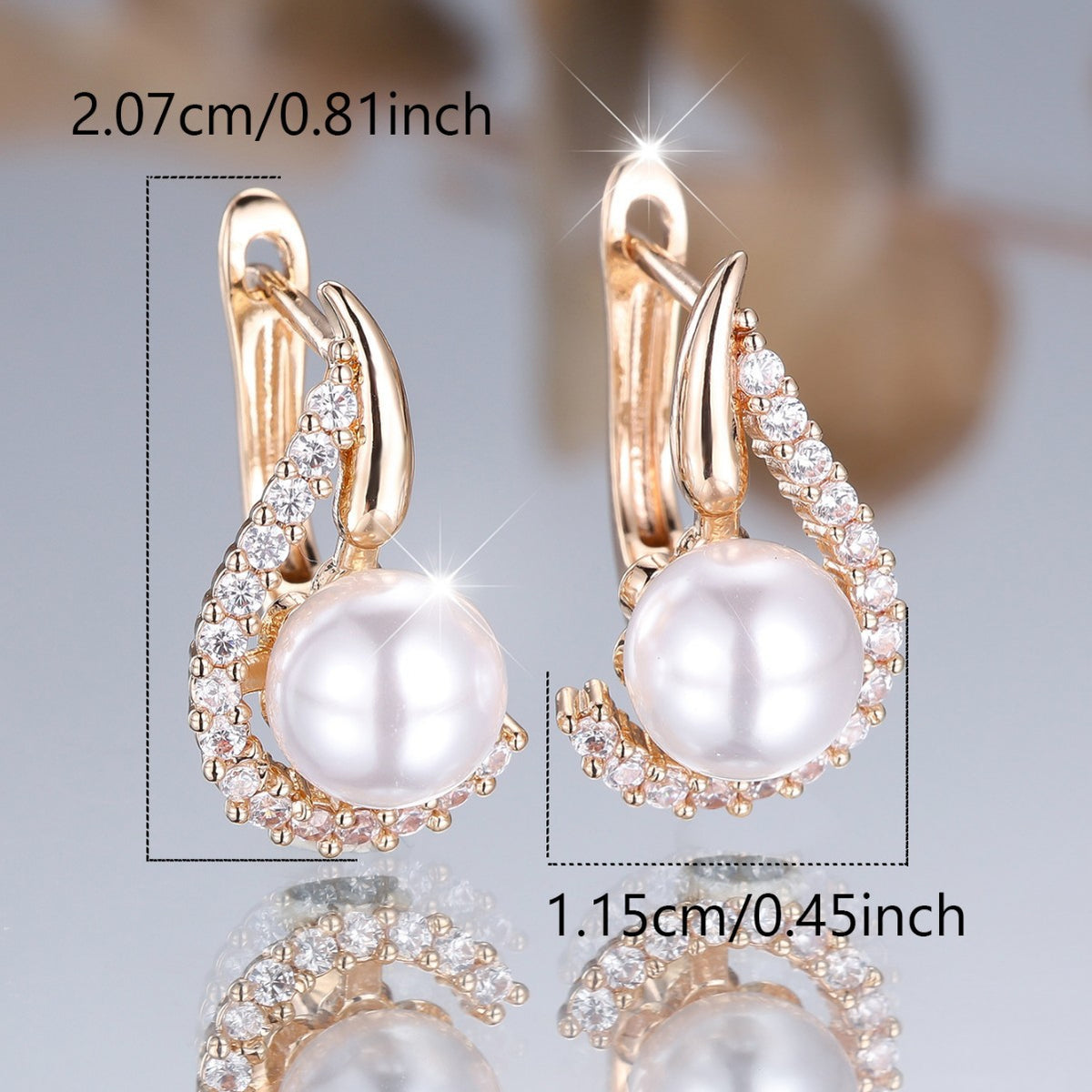 Luxury pearl earrings with rose gold setting and crystal accents, minimalist design