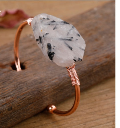Handcrafted copper wire bracelet with raw quartz and black inclusions, minimalist luxury jewelry