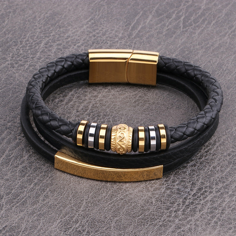 Black braided leather bracelet with gold and silver beads, magnetic clasp, minimalist luxury design