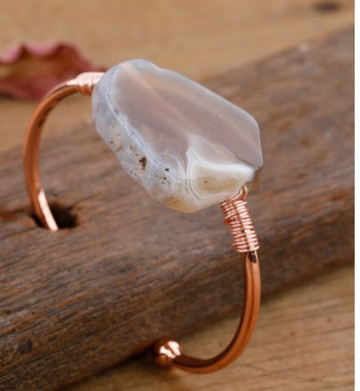 Handcrafted copper bangle with natural agate stone, minimalist luxury jewelry design