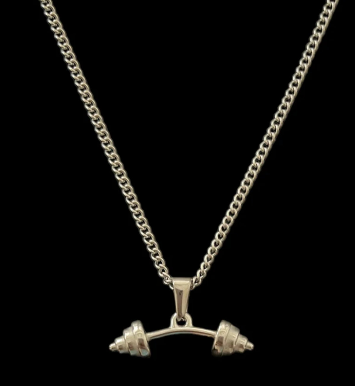 Silver barbell pendant necklace on curb chain, minimalist luxury jewelry design