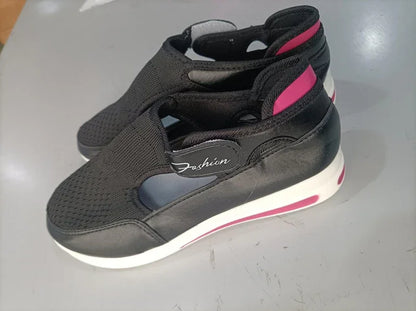 Black and pink fashion sneakers with mesh upper and white sole, minimalist design