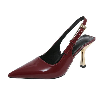 Burgundy patent leather pointed-toe slingback heel with gold-tone block heel