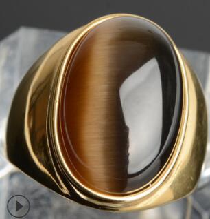 Luxury gold signet ring with oval tiger's eye stone, minimalist design, premium craftsmanship