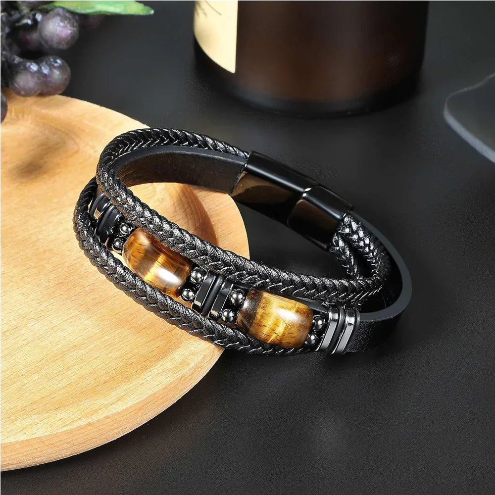 Men's braided leather bracelet with tiger eye stones and black magnetic clasp, luxury minimalist design
