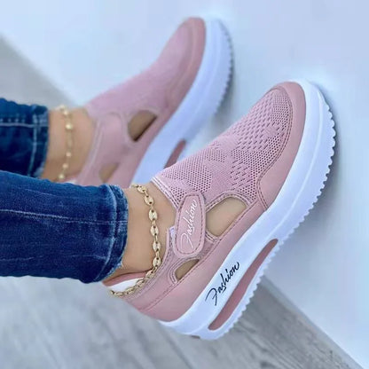 Pink mesh slip-on sneakers with white platform sole, gold chain anklet, denim jeans — stylish casual footwear
