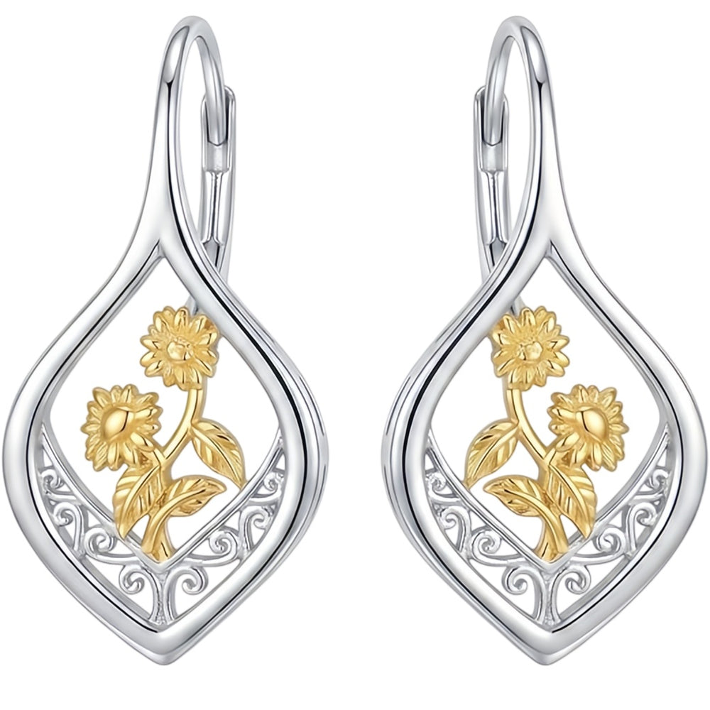 Silver drop earrings with gold filigree sunflower detail, on white background
