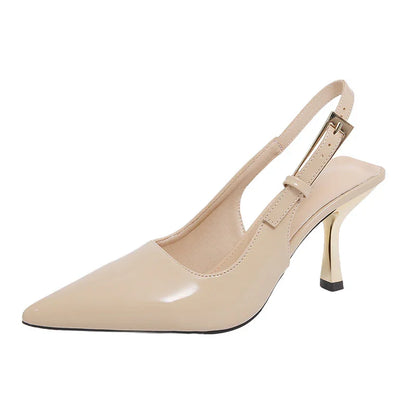 Beige patent leather pointed-toe slingback heels with gold heel