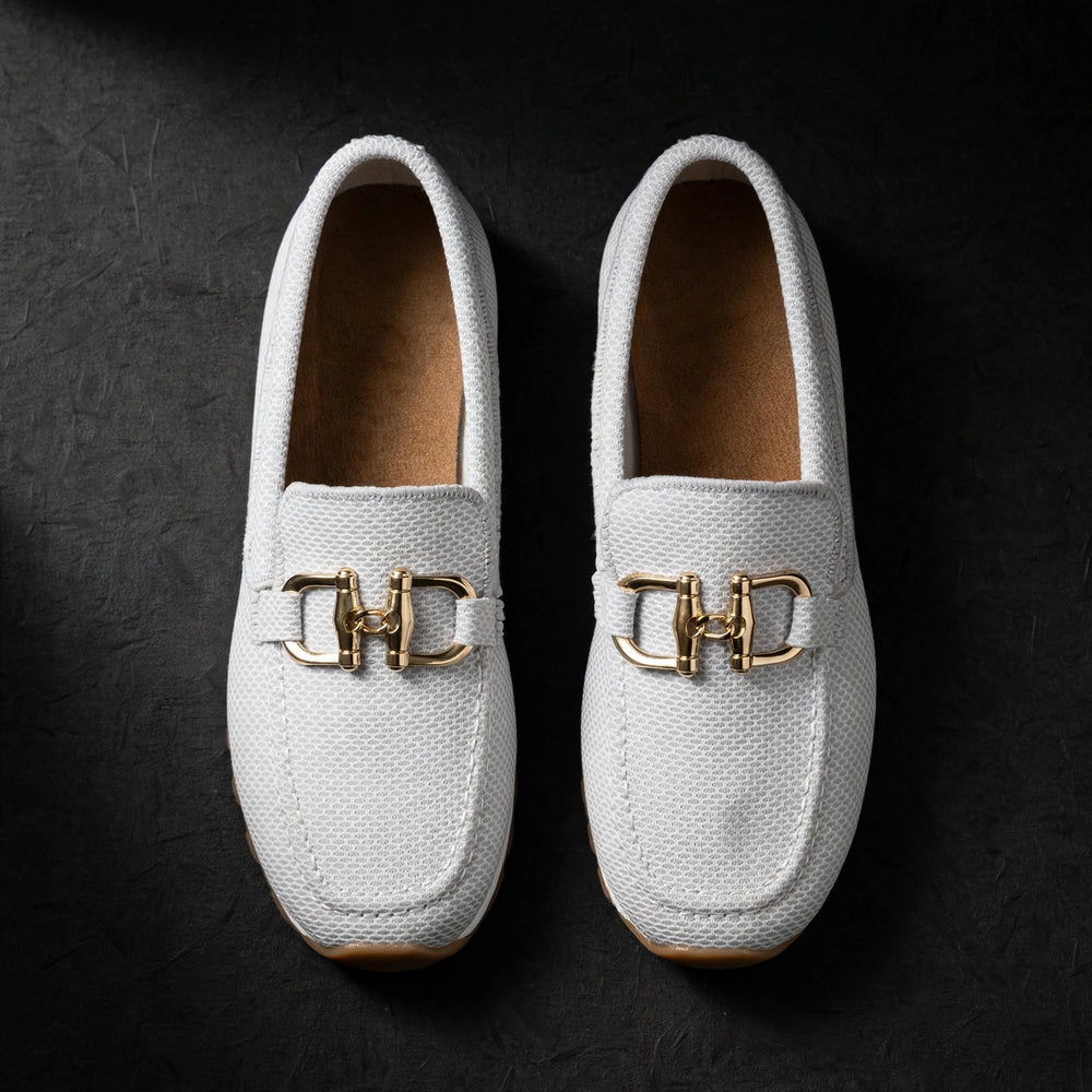 Women's woven flat loafer with gold buckle, luxury product photography