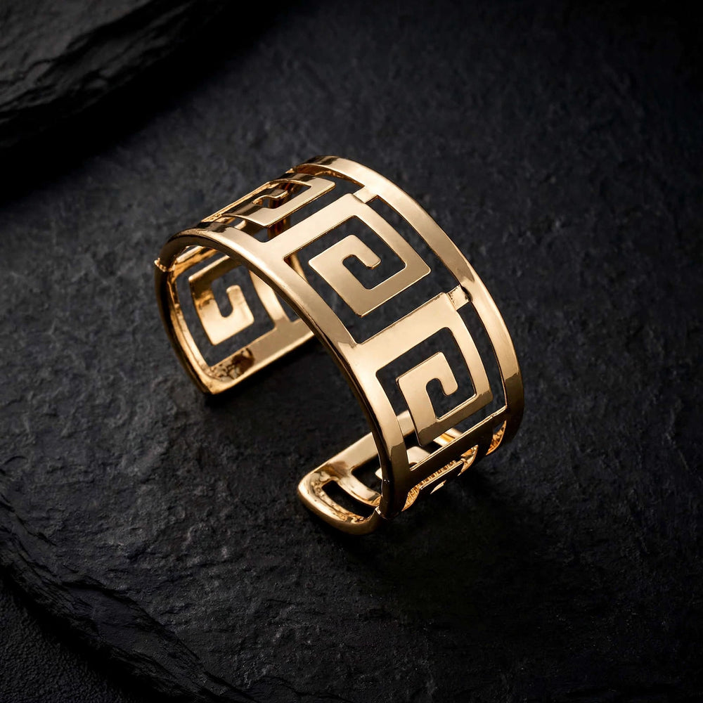 Gold geometric hollow cuff bracelet, luxury jewelry product photography